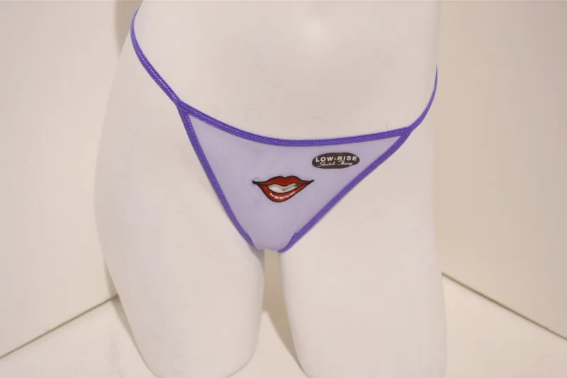 seamless panties with a concealed pocket, moisture-wicking finish, and stretchable fabric for convenience, comfort, and a smooth undergarment line.Mesh Thong with Lips